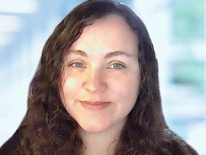 a headshot of Dr. Meighan Mary smiling at the camera